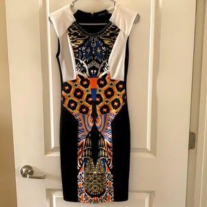 DO&BE size Small mid length dress with jeweled collar.